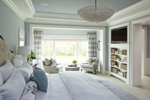 Tranquil Master Bedroom With a Small Seating Area